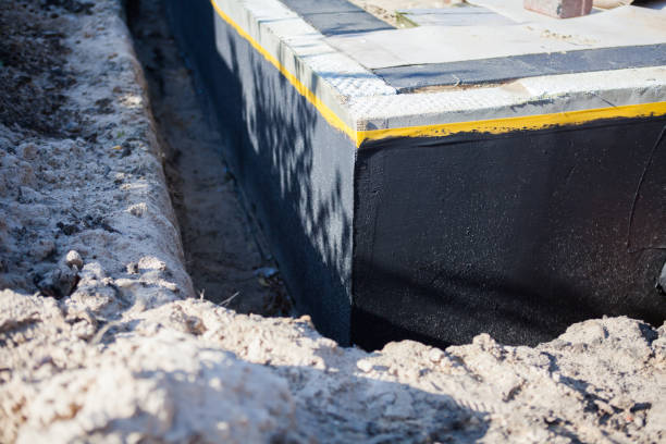 Professional Waterproofing technician working in Brooklyn, IN